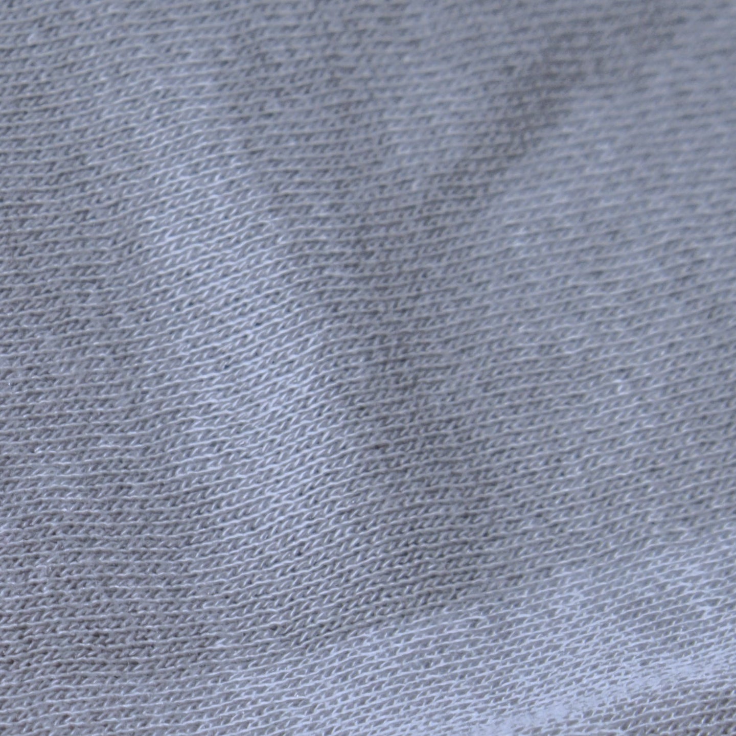 Nahaufnahme einer glatten Textiloberfläche ohne Pilling