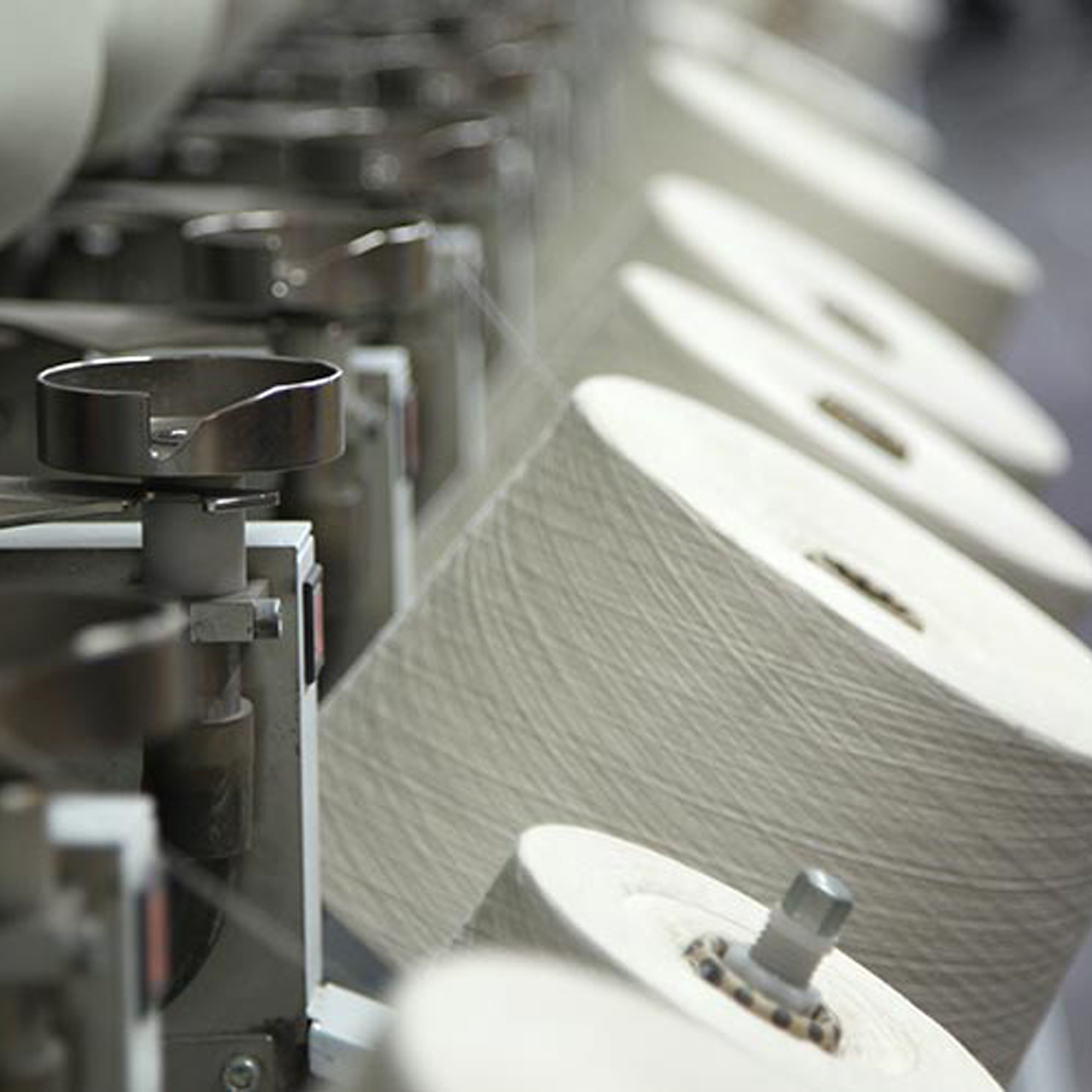 Bild von Garnspulen aus der Produktion von TOM FYFE