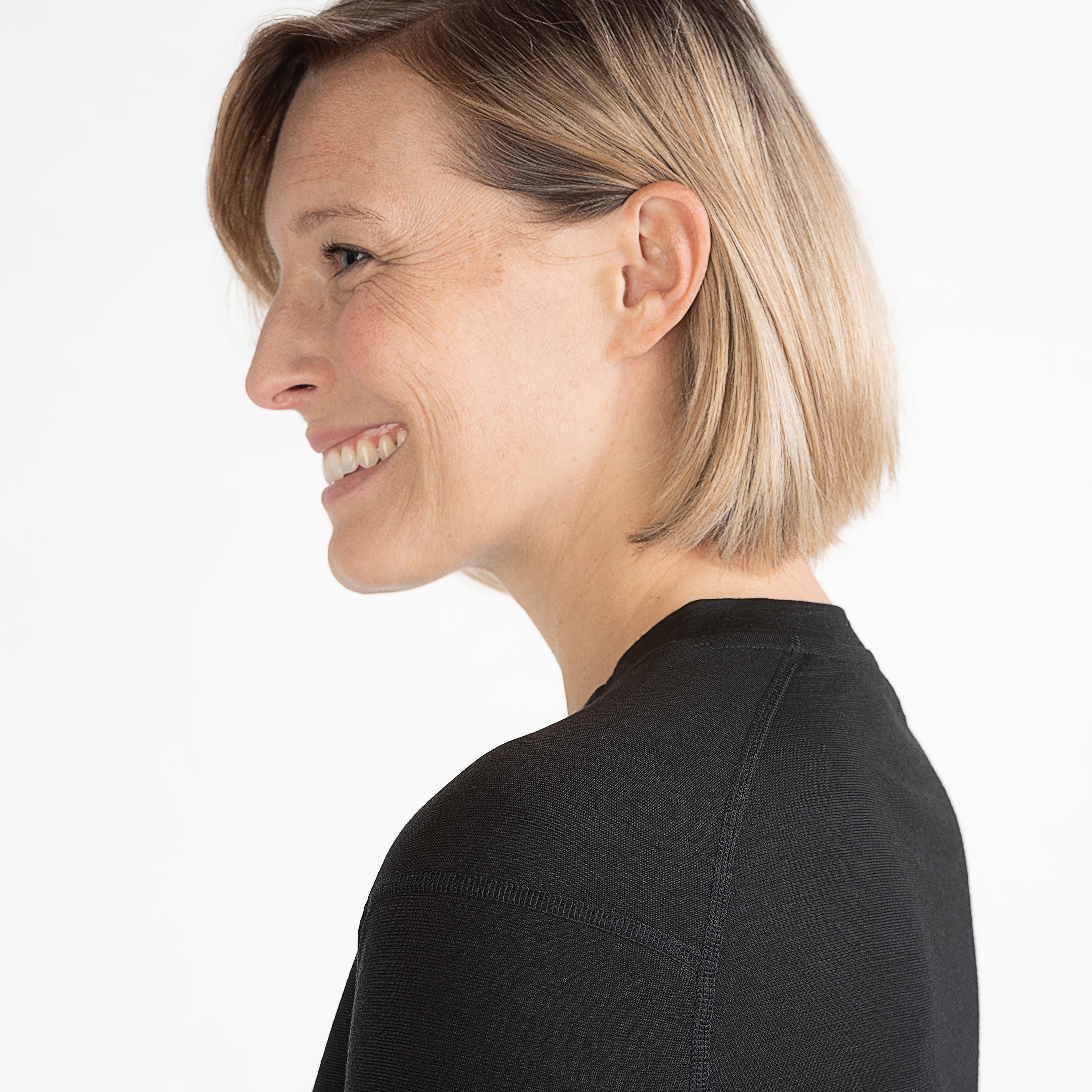 Merino Damen Unterhemd Langarmshirt Seitenansicht von TOM FYFE in Schwarz