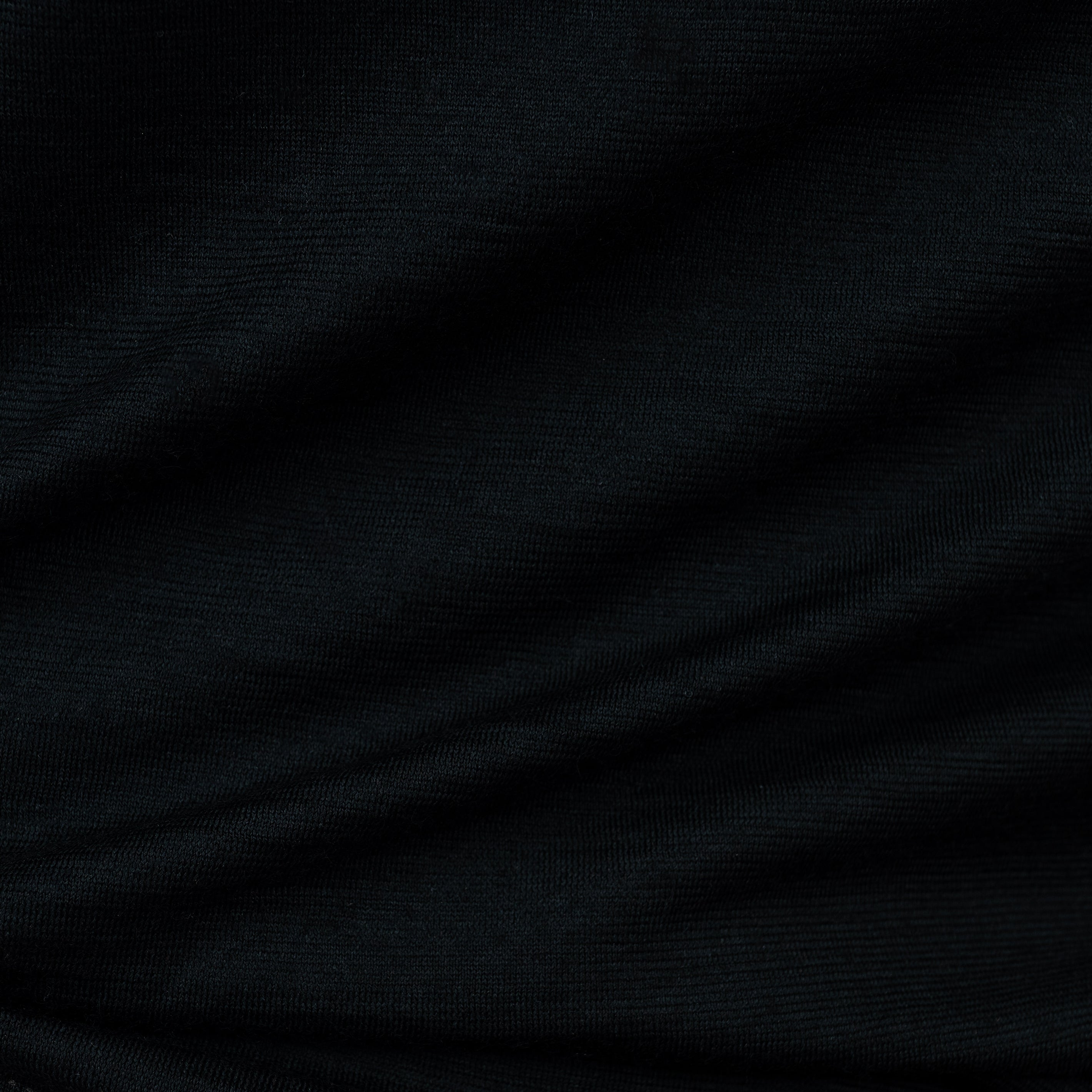 Merino Damen Poloshirt Stoffaufnahme von Tom Fyfe in Schwarz