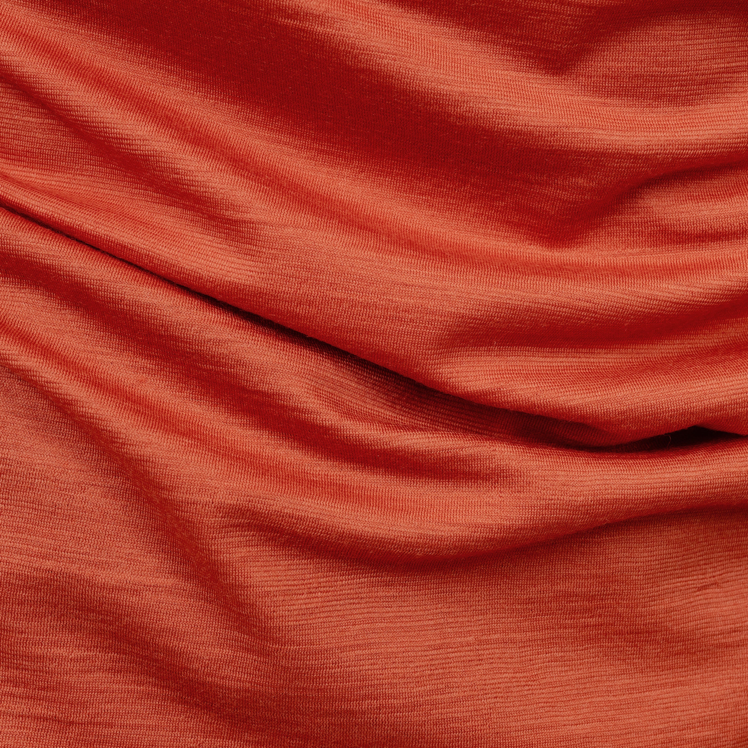 Merino Damen Shirt mit V-Ausschnitt von Tom Fyfe Stoff im Detail in Terracotta