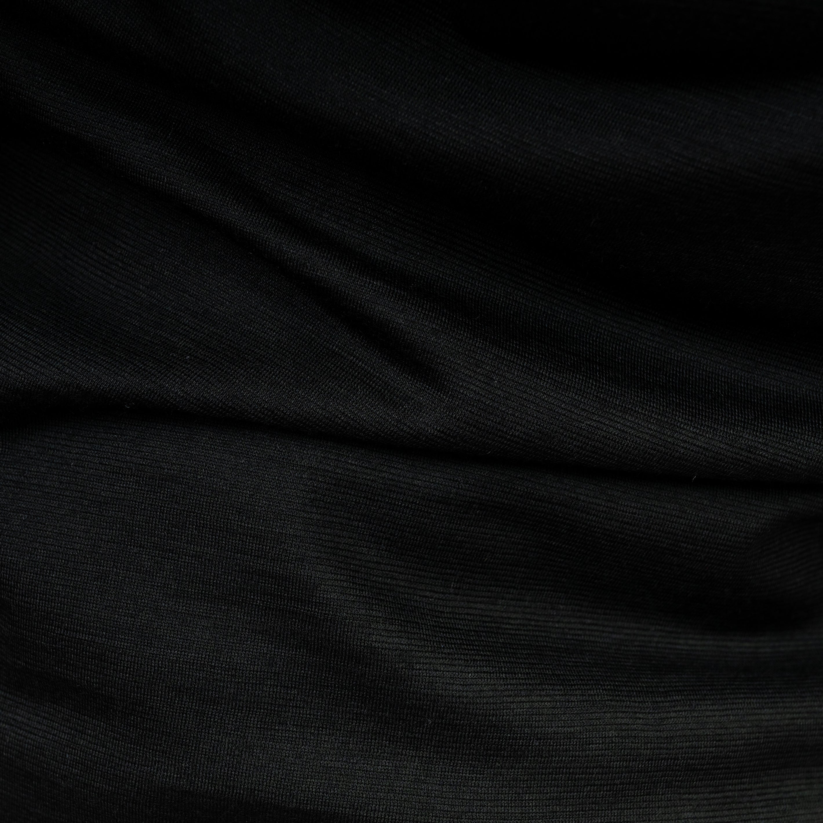 Merino Herren Poloshirt Stoffaufnahme von Tom Fyfe in Schwarz