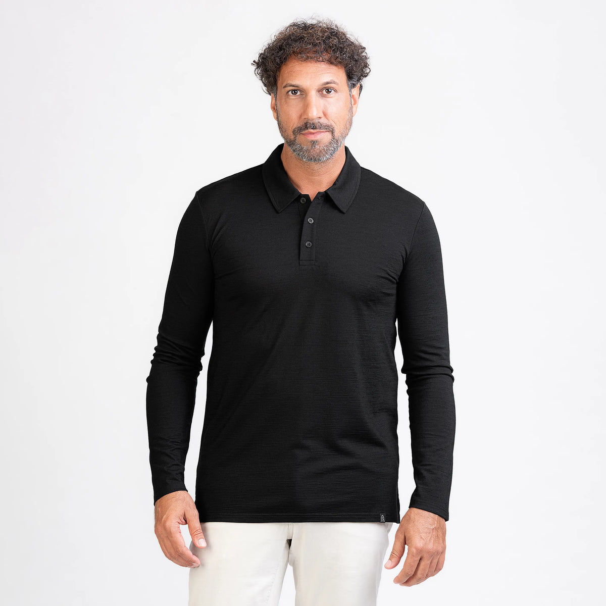 Merino Langarm Poloshirt Herren Frontansicht von TOM FYFE in Schwarz 