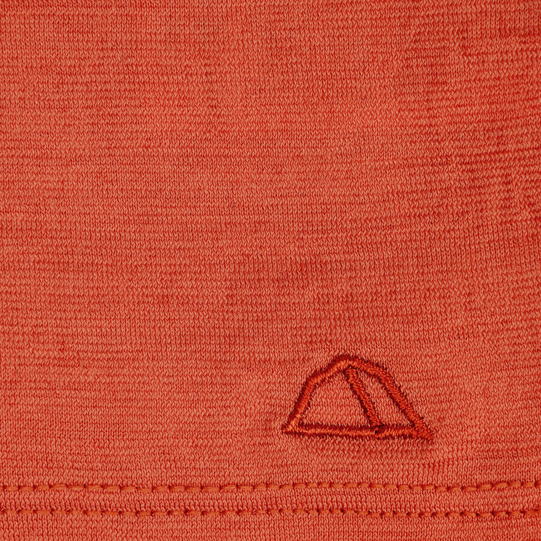 Merino Schlauchschal Multifunktionstuch gelegt mit gesticktem Logo von Tom Fyfe in Terracotta #farbe_terracotta